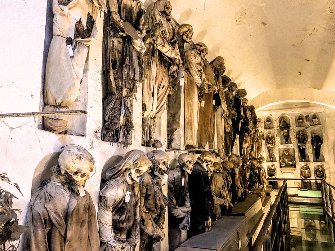 Mummified remains in niches at Palermo’s Capuchin Catacombs