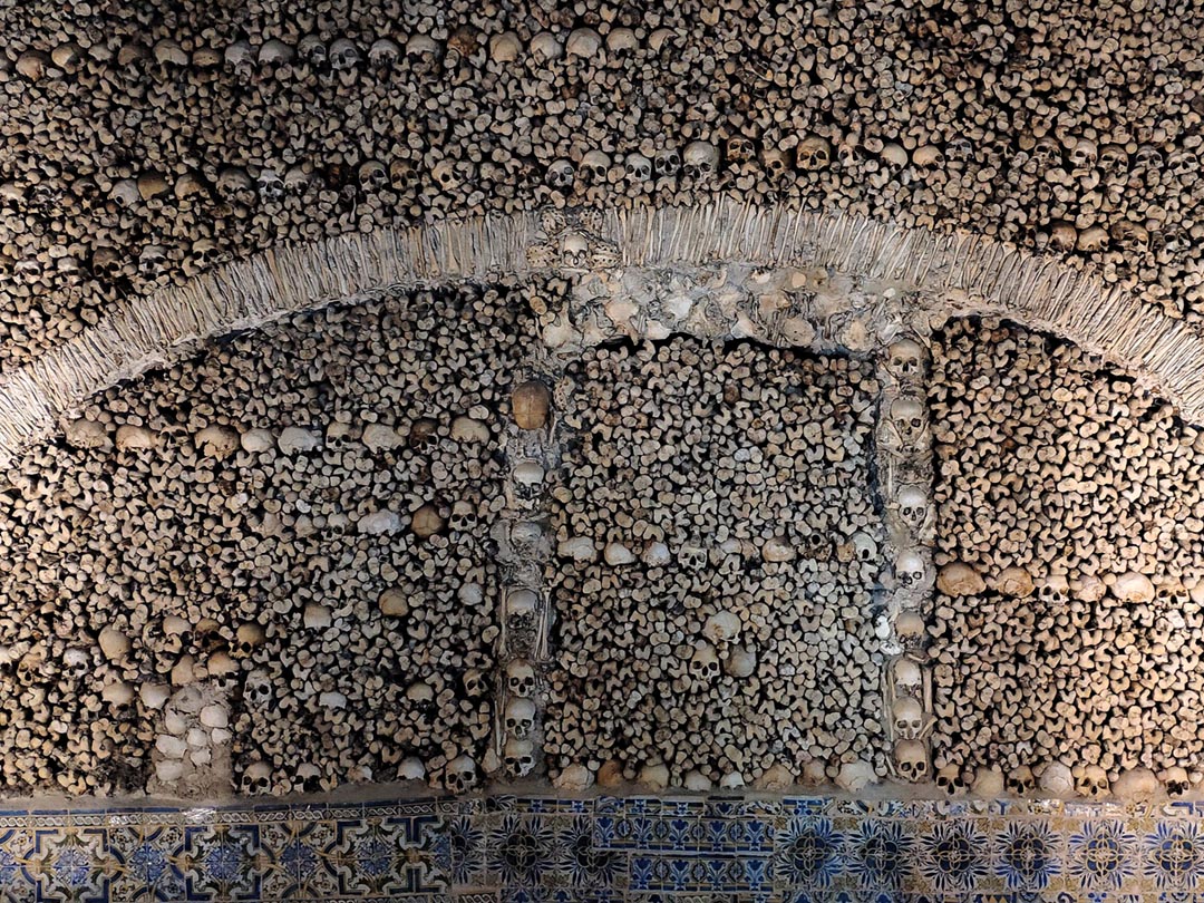 Columns and walls clad in bones inside Évora’s Chapel of Bones