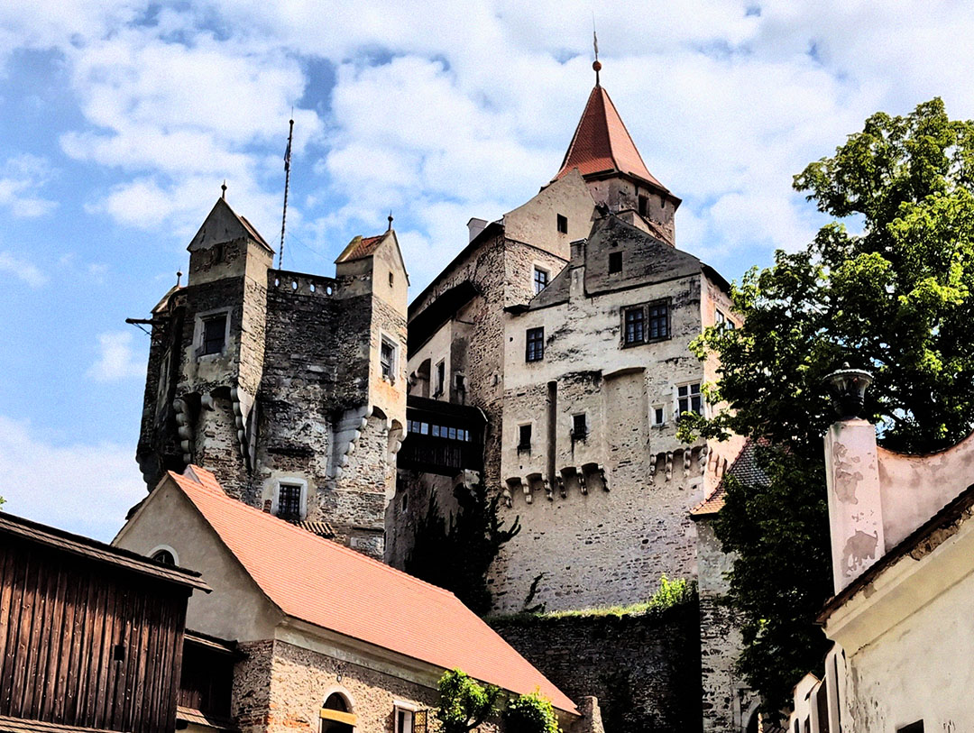 Pernštejn Castle’s gothic masonry and tight courtyard turns