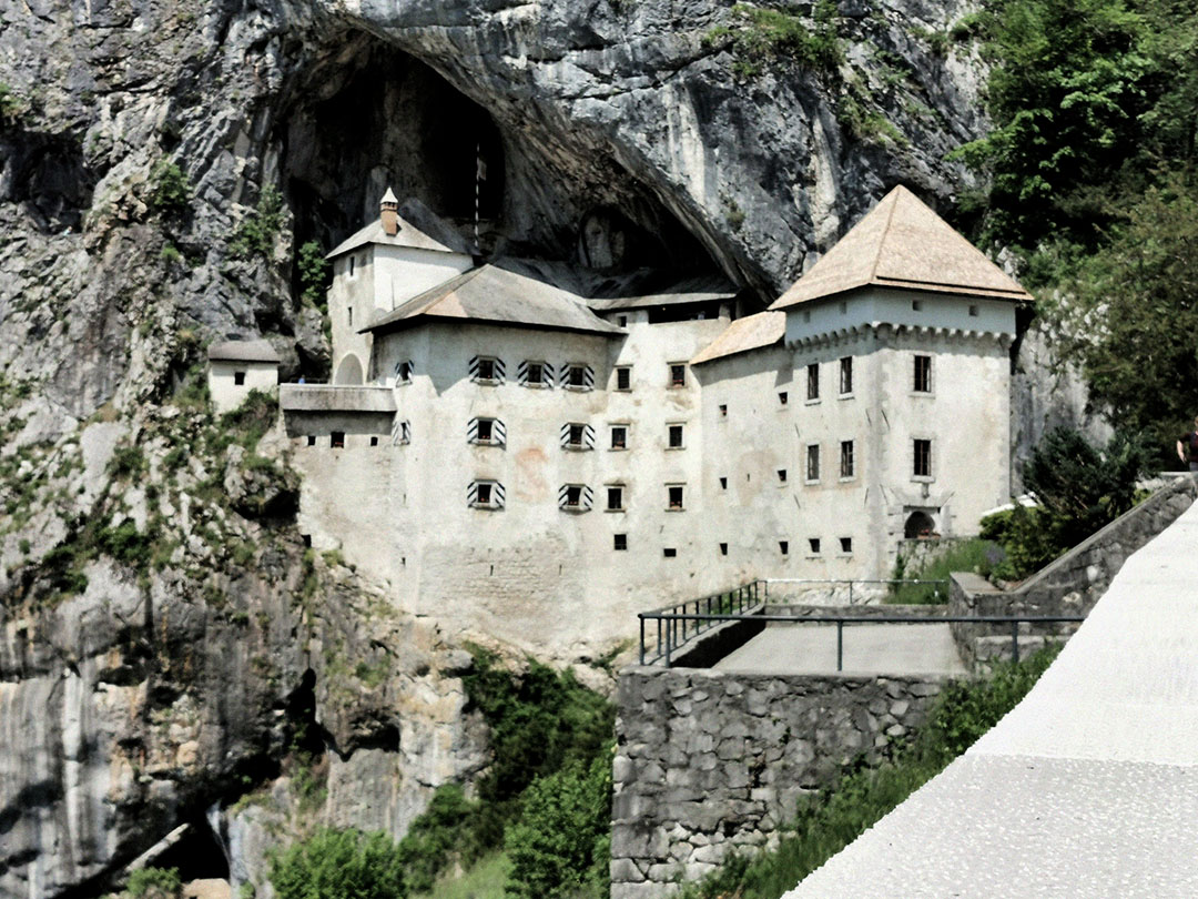 Predjama Castle built into the mouth of a limestone cliff cave