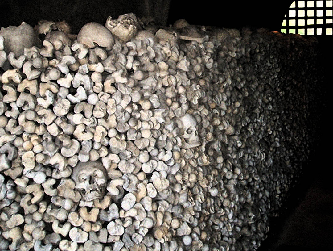 Walls of skulls and stacks of femurs at St Leonard’s Ossuary in Hythe, Kent